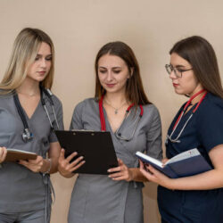 Portrait female medical team wearing uniform, healthcare and medical concept